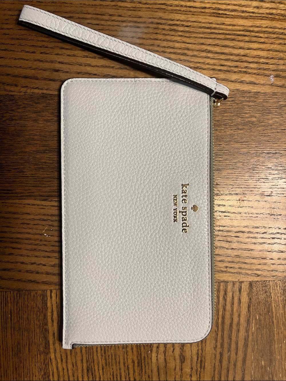 Kate spade olive green and blue pebbled leather wristlet with wrist strap